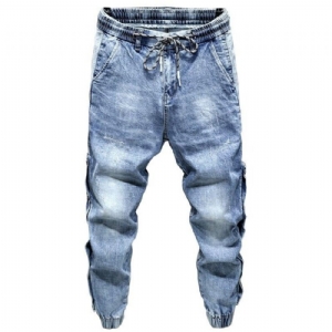 Jeansy Jogger Ze Stretchem Z Nitami Po Bokach